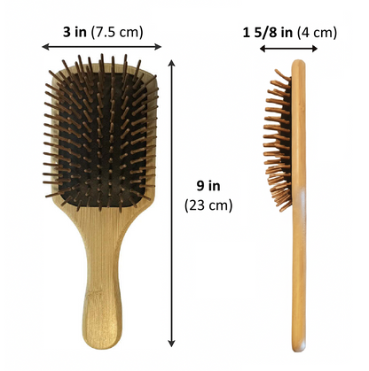 Wooden hairbrush with measurements on a white background